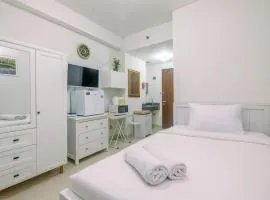 Minimalist and Cozy Studio (No Kitchen) Transpark Cibubur Apartment By Travelio