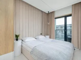 Nowoczesny Apartament Przy Plaży z Parkingiem by Noclegi Renters
