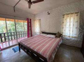 T Stop Estate, hotell i Kurchi