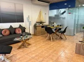 Apartamento Nuria,Centro del Pueblo,Planta baja con jardin, Aire Acondicionado
