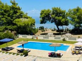 SUNRISE BEACH VILLA, - garden gate opens onto the beach
