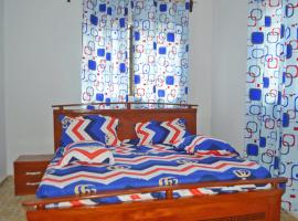 Appartement avec terrasse, hotel pro pobyt s dom&aacute;c&iacute;mi mazl&iacute;čky v destinaci Kpalim&eacute;