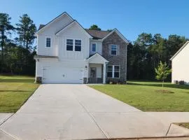 Charming Serenity Awaits The Zebra & Coffee Suites - Dual Queen Bedrooms with Exclusive Comforts, Open Quartz Kitchen, and Lush Patio Near Shopping Bliss