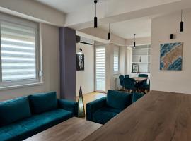 Modern 2-Bedroom Apartment with Private Garage Skopje, hotel i Skopje