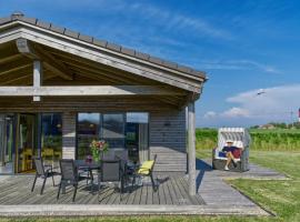 Gud Jard Lodge Nr 17 - Design-Ferienhaus mit exklusiver Ausstattung, hotelli kohteessa Pellworm