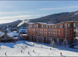 New luxury ski in ski out 4 bedroom at One At Spruce Peak By Stowe Mountain Rentals