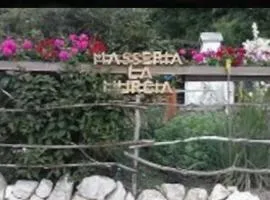 Wildcamp Resort Masseria la Murgia Unterkunft in einem Wohnwagen