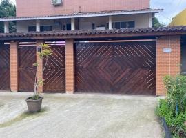 Refúgio das Ondas I Suítes perto da praia com conforto e self check-in, hotel in Bertioga