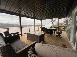 RiverSuite1 - A mesmerizing river and bridge view.