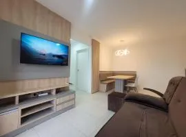 Apartamento novo, vista mar, 150m da praia