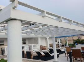 New condo with sea view 1, condo in Wheeland Settlement