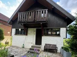 Studio neuf rez de jardin dans chalet individuel