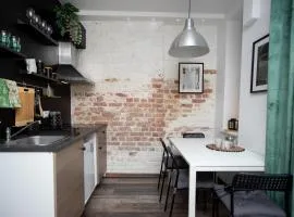 Stay by the Andrejsala area with Free Parking and reach the Old Town in 15 min walk