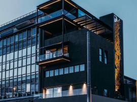 Earth Boutique Apartments next to Stavros Niarchos