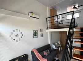 Central Suites by H&R, hotel v destinaci Villeta