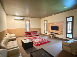 Beach Chalet - 8, hotel v destinaci Al Ḩadd