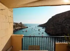 Seafront duplex Penthouse with Terrace overlooking Xlendi Bay