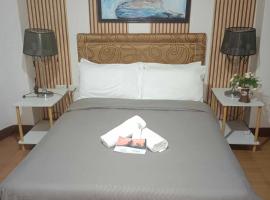 Daily Travellers Inn & Suites, Hotel in Baclayon