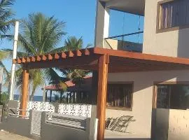 Casa de Praia, pé na areia Guaratiba Prado - Bahia