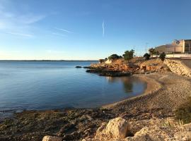 Apartament L'Ampolla MONICA a 50m del mar amb parking, hotel in L'Ampolla