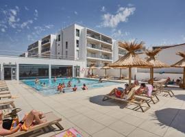 R&eacute;sidence Odalys L'Or&eacute;e du Parc, hotel com estacionamento em Royan