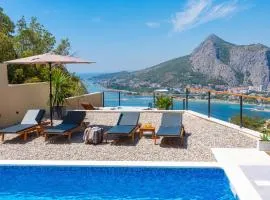 Casa Vita featuring a sea view, billiards, and heated pool