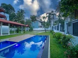 The Grand Bliss, Luxurious Modern Villa with Spacious Private Garden, Swimming Pool, Gym, and Free Wi-Fi