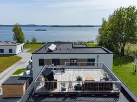 Sonnendeck Schwerin - Apartment mit Dachterrasse, Seeblick, Parkplatz, Fahrradschuppen, King-Size Bett - seenah relaxen