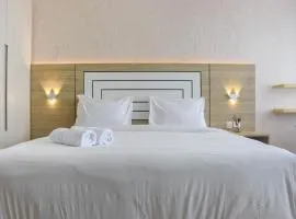 Fully Furnished with Cozy Design Studio at Menteng Park Apartment By Travelio