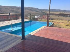 Casa com piscina Capitólio, hotell i Capitólio