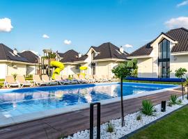 Family Resort Ustka - Domki dwupoziomowe z basenem