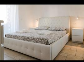 Pau suite home, hotel de playa en Fiumicino
