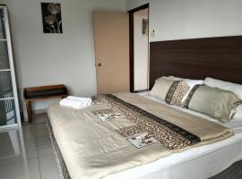 Marina Heights Home Suite Teluk Batik, παραλιακό ξενοδοχείο σε Lumut