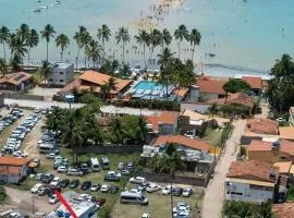 Sol, Mar e Tranquilidade a poucos passos do Caminho de Moisés com Varanda Privativa e Estacionamento