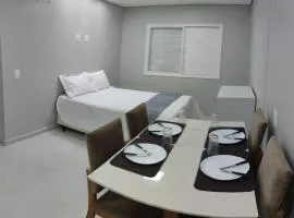 Apartamento novo ao lado de Faculdade