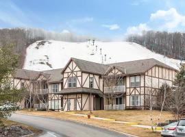 Relax in this 1BD resort condo after skiing at Boyne Mountain、Boyne Fallsのコンドミニアム