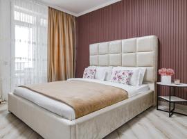Красивые апартаменты в жк Only Sun, hotel in Prigorodnyy