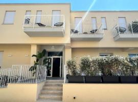 Hotel Perla, hotel v destinaci Castiglione della Pescaia