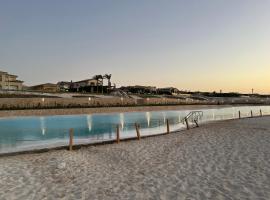 Townhouse Villa Marassi North Coast、エル・アラメインのホテル