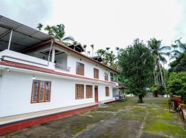 Wayanad Palm Grove Retreat 1st Floor, chỗ nghỉ tự nấu nướng ở Wayanad