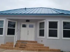 Stylish 2 bedroom home Steps from private beach
