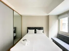 Homey and Cozy Stay Studio Gateway Park LRT City Jatibening Apartment By Travelio