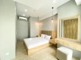 Simply Look and Comfort 1BR Vasanta Innopark Apartment By Travelio
