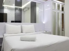 Comfort 2BR Apartment at 30th Floor Transpark Cibubur By Travelio