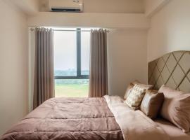 Calma 2BR II at Skyhouse Apartment, hotel i Samporo