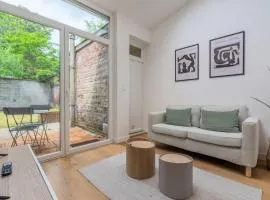 Appartement une chambre avec jardin, proche tram