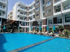 Relaxing 3BR 2BA Retreat with Four Pools Gym and Onsite Dining Close to El Gouna