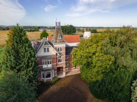 Manoir du Moulin, מלון עם חניה בBerloz