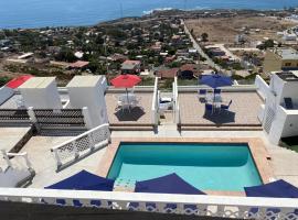 Guzman Suites, Hotel in Medio Camino