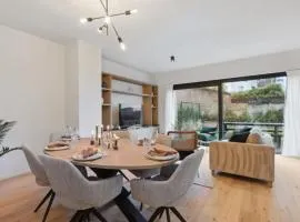 Triton luxe gelijkvloers appartement met tuin en gratis garage